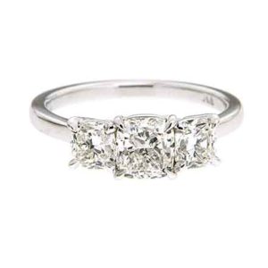 Prong set engagement ring with side stones