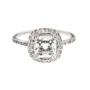 Cushion cut diamond engagement ring with halo